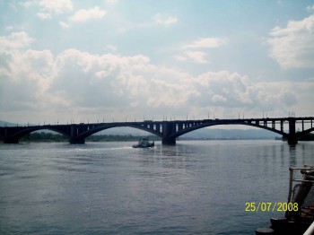 набережная левобережья. коммунальный мост