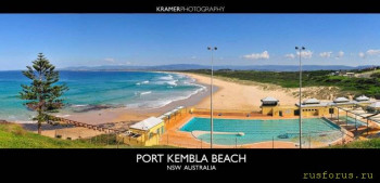 На фото: Знаменитый пляжный комплекс Порт Кембла.<br />              На переднем плане чаша 50-метрового бассейна<br />              олимпийского типа с восемью дорожками с <br />              постоянной регенерацией морской воды; на<br />              ближнем плане - сопряжённый с основной чашей<br />              детский бассейн с водой глубиной по колено. <br />              На заднем плане - полоса знаменитого пляжа,<br />              уходящего в бесконечность.